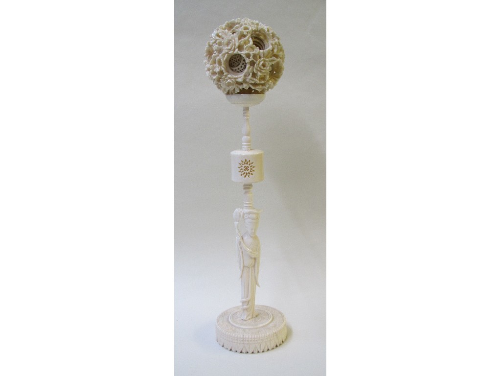 Appraisal: A Chinese ivory concentric ball on stand the pierced foliate