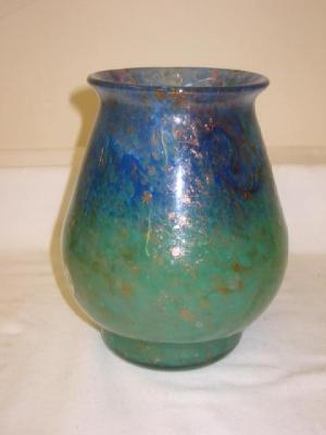 Appraisal: A MONART GLASS VASE of bellied form with flared rim