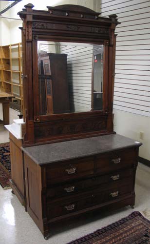 Appraisal: A VICTORIAN WALNUT LOW DRESSER WITH ATTACHED TALL MIRROR Eastlake