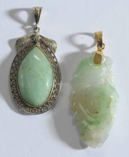 Appraisal: Two kt Green Hardstone Pendants one with open wire-work and