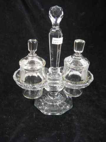 Appraisal: Cut Crystal Condiment Set holder and two covered jars possibly