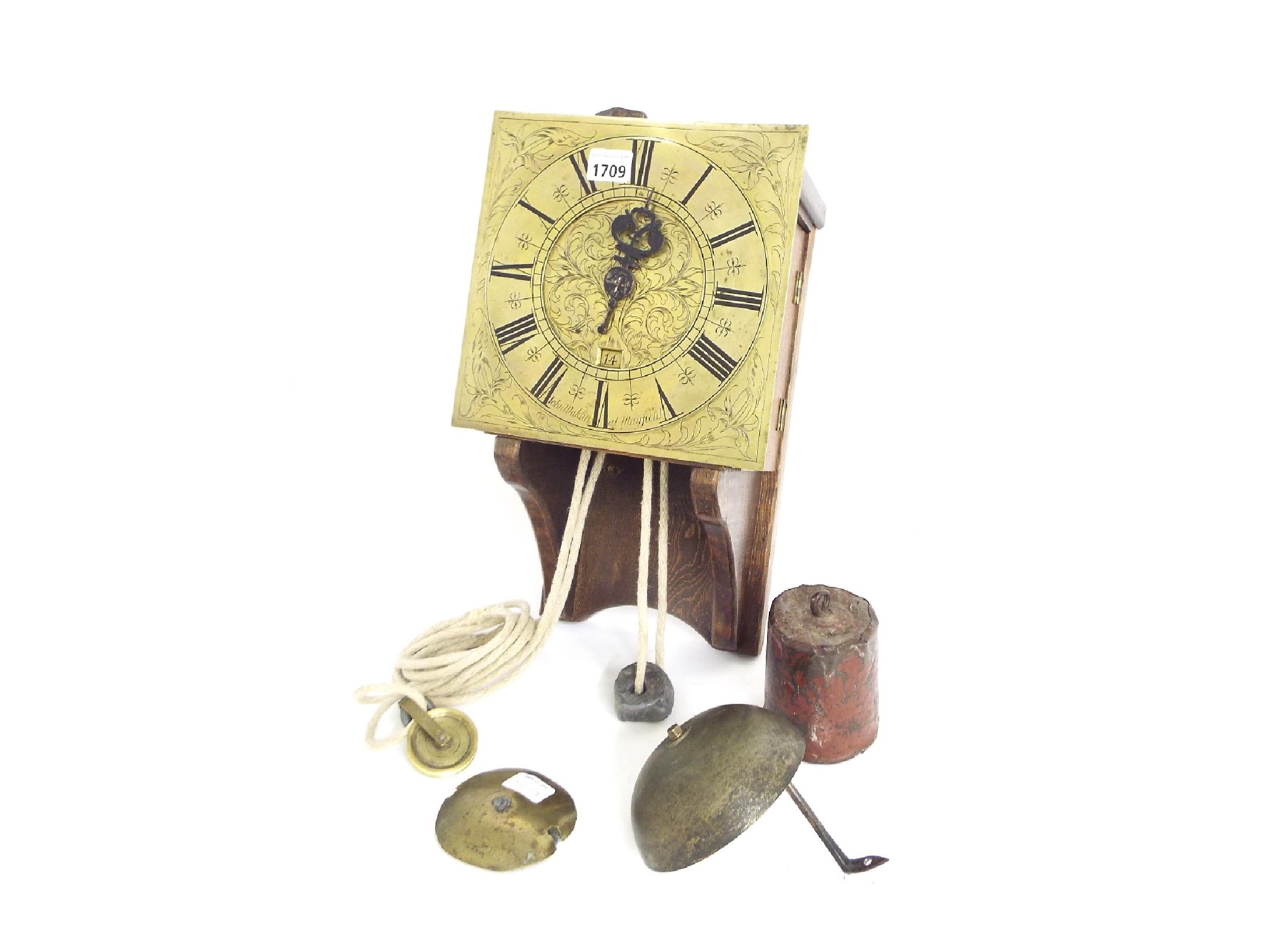 Appraisal: Oak thirty hour hooded wall clock the square brass dial