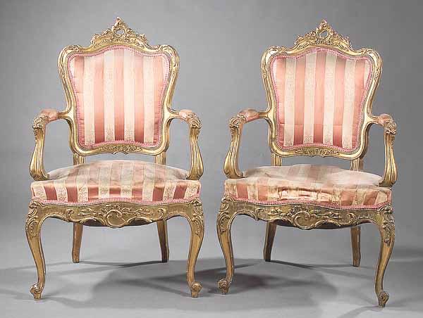 Appraisal: A Pair of Antique Louis XV-Style Carved Giltwood Fauteuils with