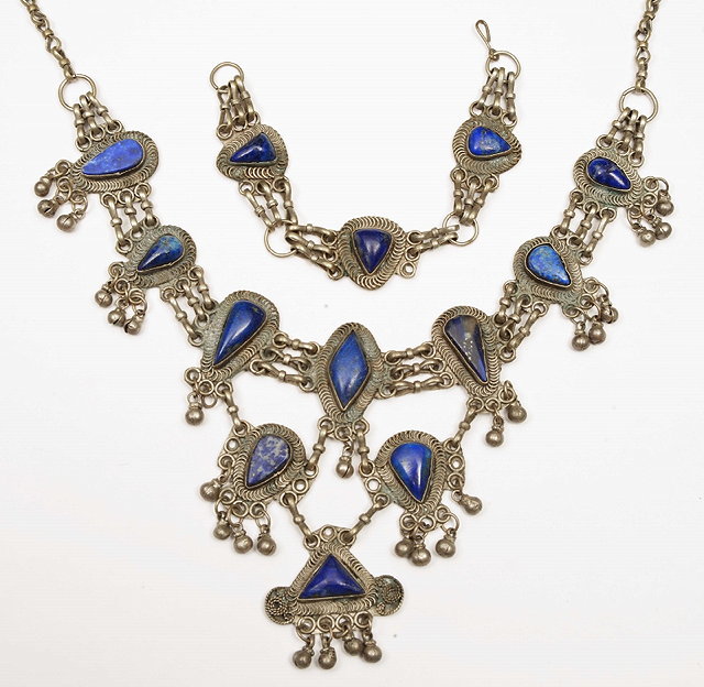 Appraisal: AN AFGHANISTAN NECKLACE with lapiz lazuli set metal panels and