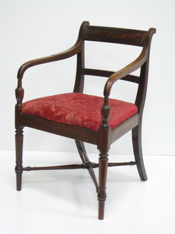 Appraisal: A Regency mahogany Carver Chair urn shaped arms above cross