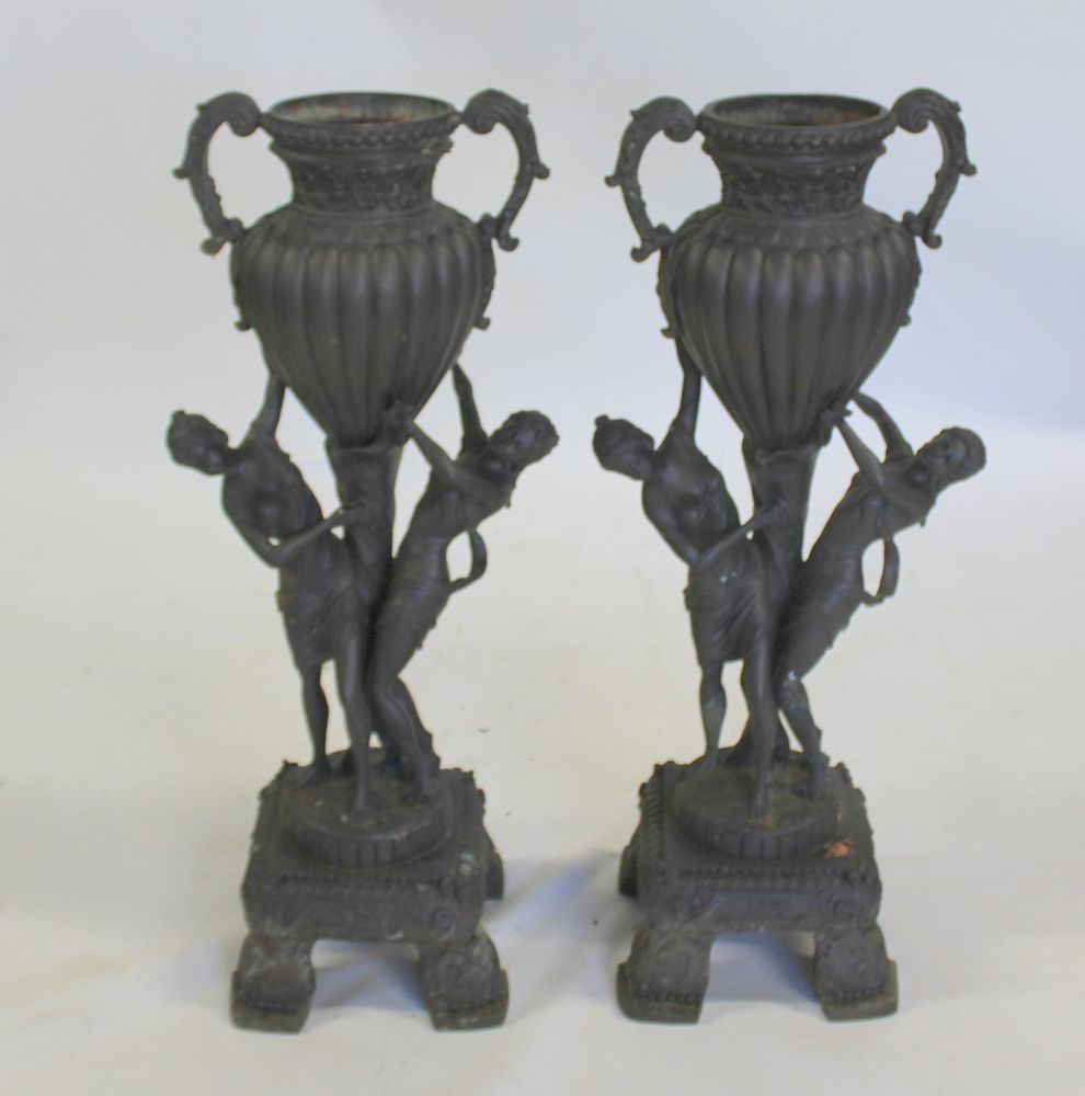 Appraisal: Pair Of Antique Cast Metal Figural Planters Good quality casting