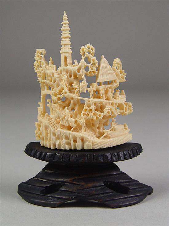 Appraisal: Carved ivory Temple Scene Circa Carved front and back Scene