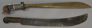 Appraisal: Two early wood handled machetes one with carved face and