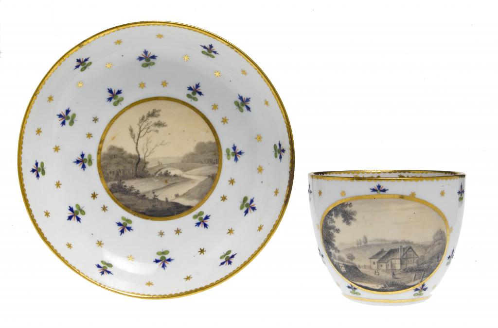 Appraisal: A DERBY TEA BOWL AND SAUCER painted en grisaille over