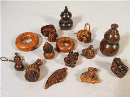 Appraisal: Fourteen Chinese carved wooden miniatures qing dynasty Comprising three double-gourd