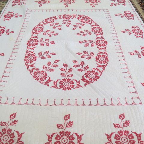 Appraisal: Handmade Quilt red with a red and white floral border