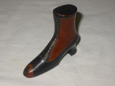 Appraisal: A WOODEN SNUFF BOX modelled as a boot in brown