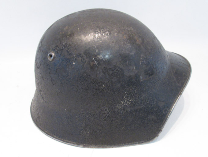 Appraisal: WORLD WAR II SWISS MILITARY HELMET painted black with visor