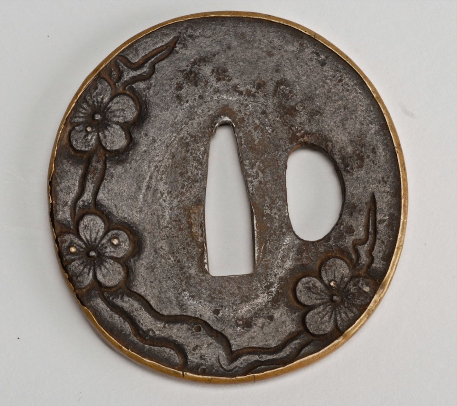 Appraisal: IRON SHIN NO MARU-GATA TSUBA th CenturyWith cherry blossom design