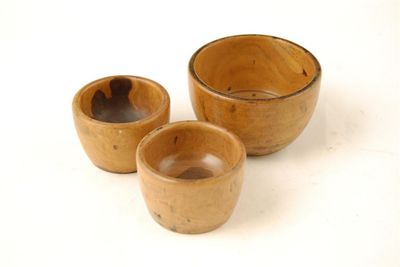 Appraisal: A th century turned lignum counter bowl in cm dia