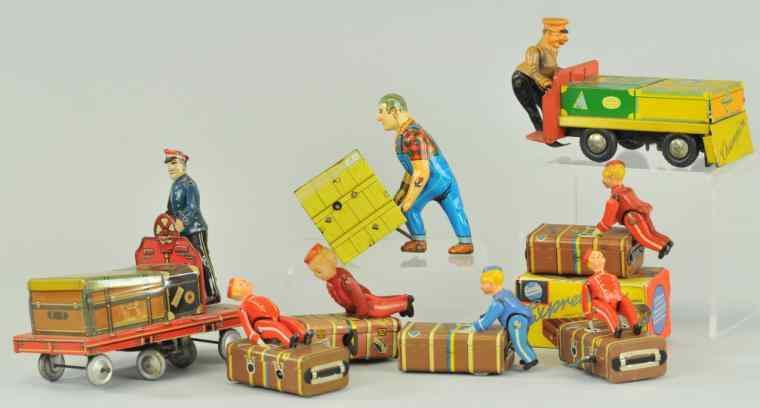 Appraisal: LOT OF TOY BAGGAGE HANDLERS Interesting grouping of men and