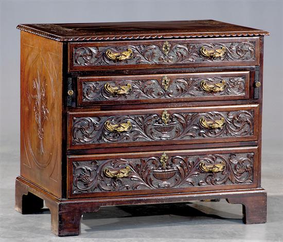 Appraisal: English carved mahogany chest with butler's drawer th century rectangular