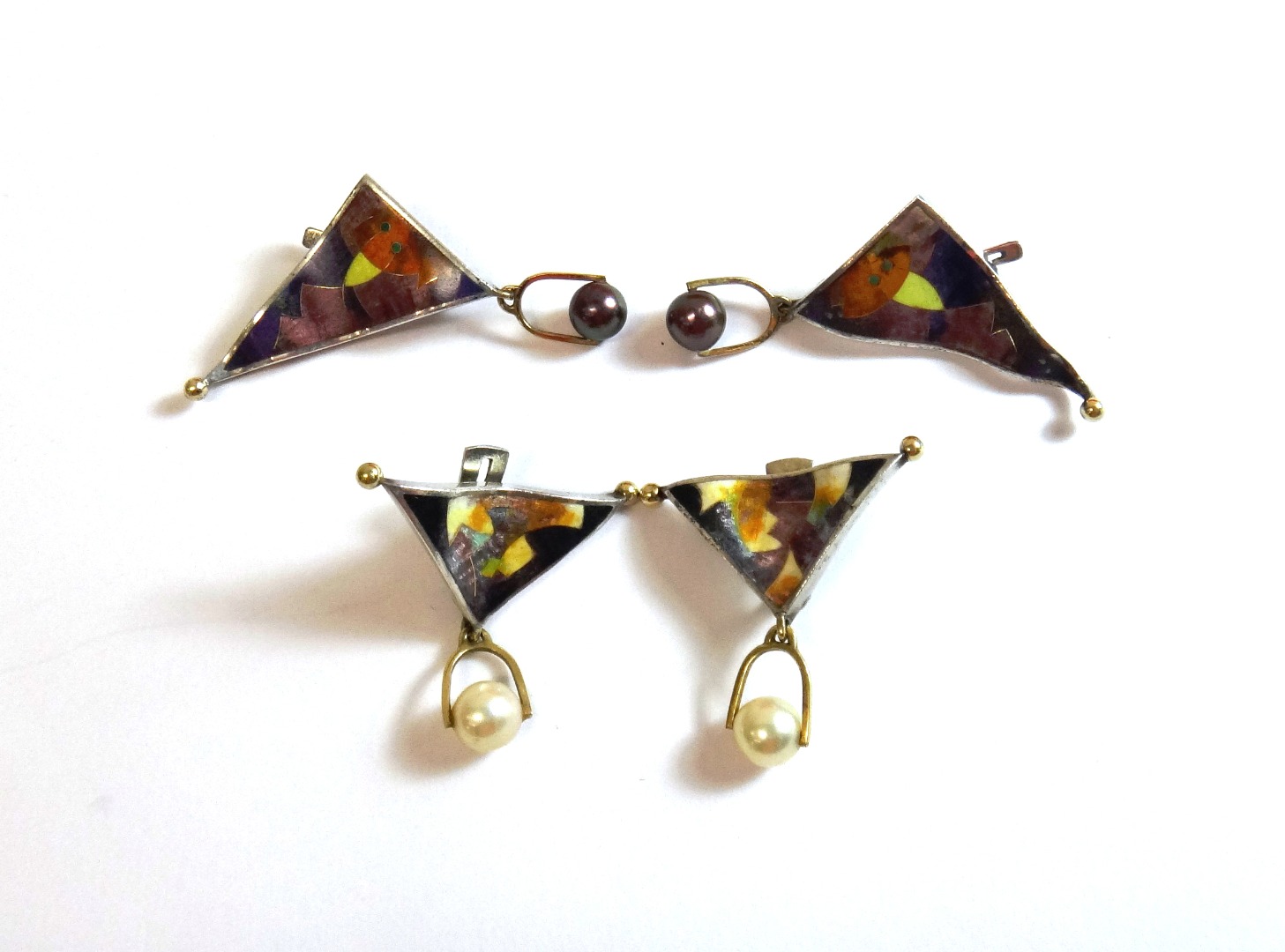 Appraisal: A pair of silver enamelled and black tinted cultured pearl