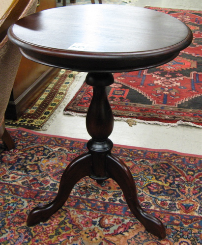 Appraisal: PAIR OF MAHOGANY TRIPOD LAMP TABLES having round tops over