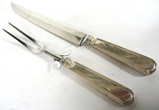 Appraisal: Tiffany Co Sterling Carving Set Comprising two tined meat fork