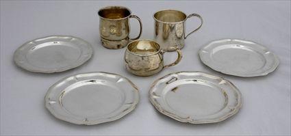 Appraisal: FOUR MEXICAN SILVER BREAD AND BUTTER PLATES AND THREE AMERICAN