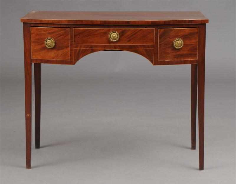 Appraisal: GEORGE III MAHOGANY BOW-FRONTED SIDEBOARD The bow-fronted top over three