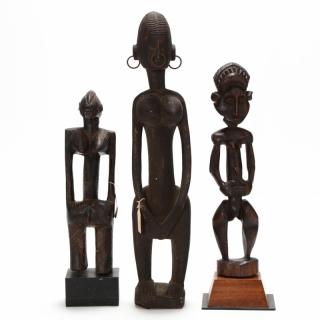 Appraisal: Three West African Standing Female Figures carved wood the first