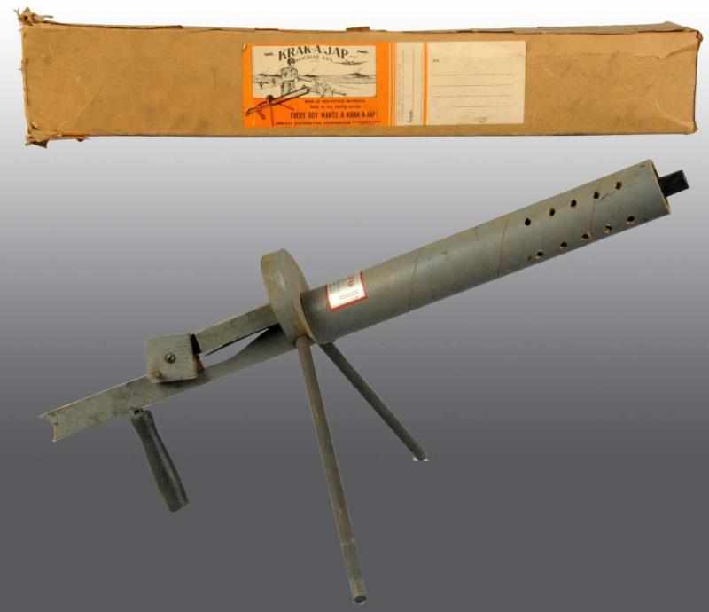 Appraisal: Krak-A-Jap Machine Gun Toy Description Includes original box Manufactured by