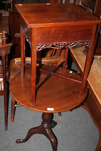 Appraisal: A MAHOGANY SMALL CIRCULAR TRIPOD TABLE a square top occasional