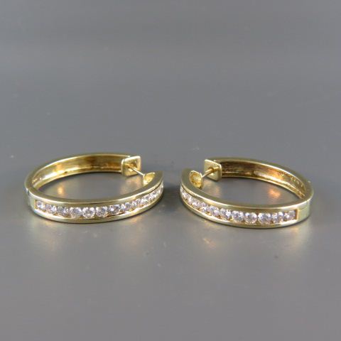 Appraisal: Diamond Earrings round diamonds totaling carats in k yellow gold