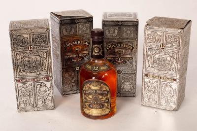 Appraisal: Whisky four bottles of Chivas Regal year old boxed bottles