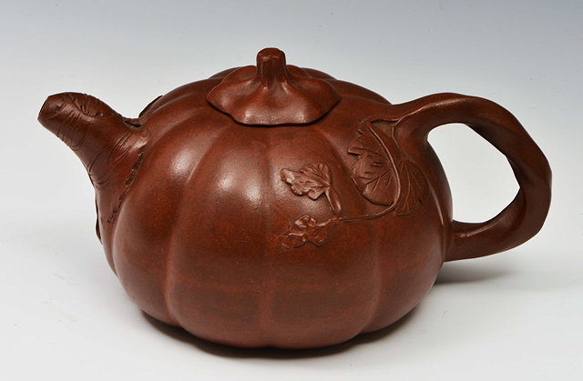 Appraisal: A YIXING MELON SHAPED TEAPOT and cover cm