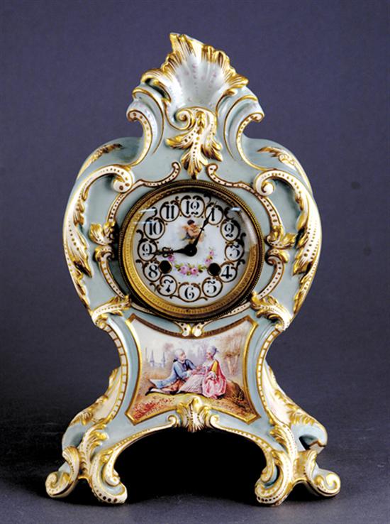 Appraisal: French mantel clock circa acanthus-and-scrollwork framed shaped case adorned with