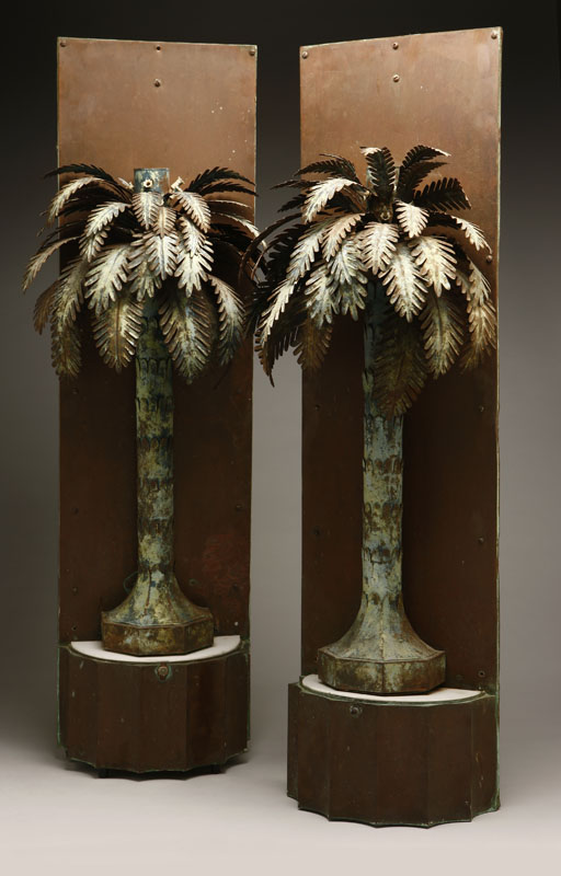 Appraisal: A pair of Art Deco painted tin palm tree-form wall