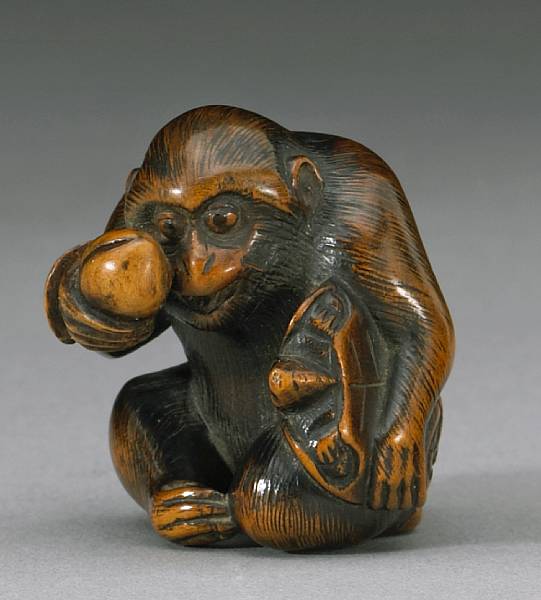 Appraisal: A wood study of a monkey By Mitsuhide th Century