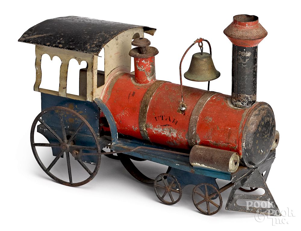 Appraisal: American tin clockwork Utah train locomotive Althof Bergmann painted American