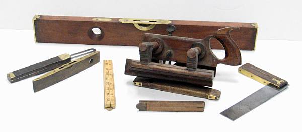 Appraisal: Accumulation of th Century Tools Planes tape measurers four squares