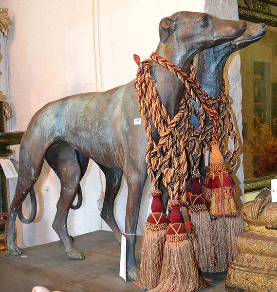 Appraisal: A PAIR OF BRONZE FIGURES OF HOUNDS each standing animal