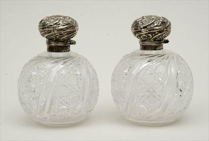 Appraisal: Assembled Pair of English Silver-Lidded Cut-Glass Scent Bottles Birmingham and