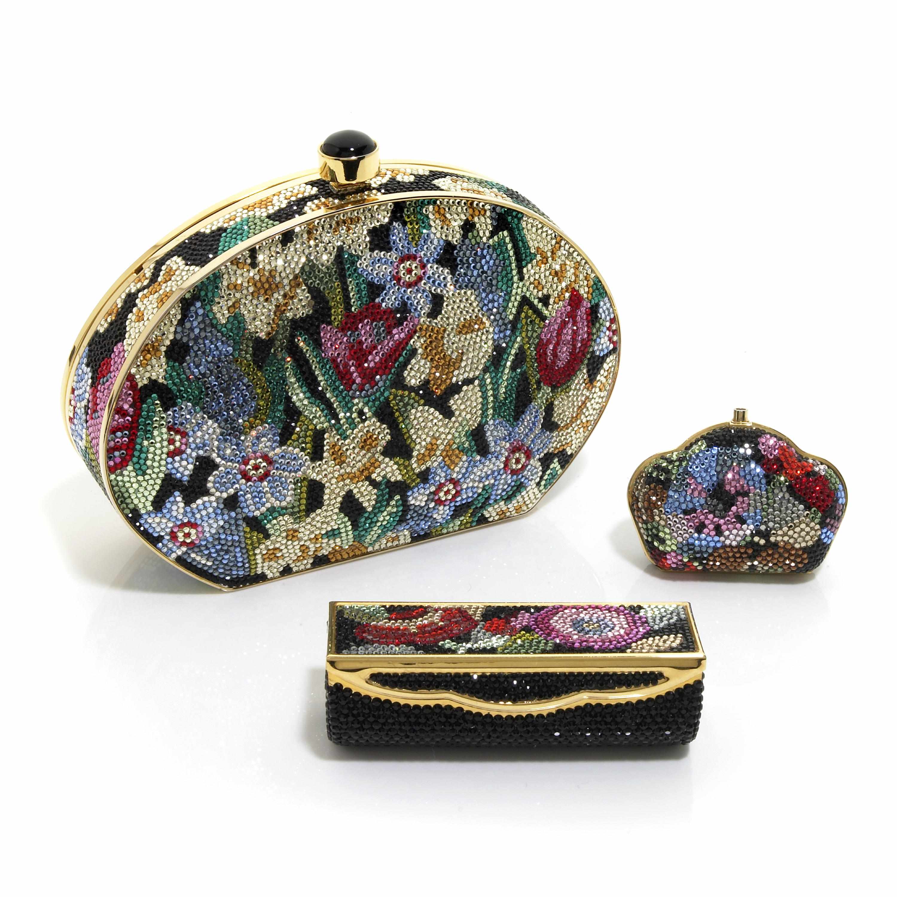 Appraisal: A black and multi-colored crystal flower motif purse with gold