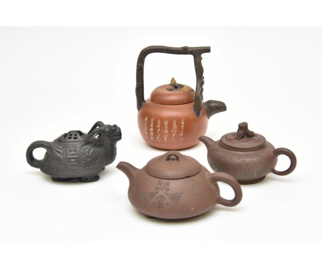 Appraisal: Four Chinese pottery teapots all signed largest h x w