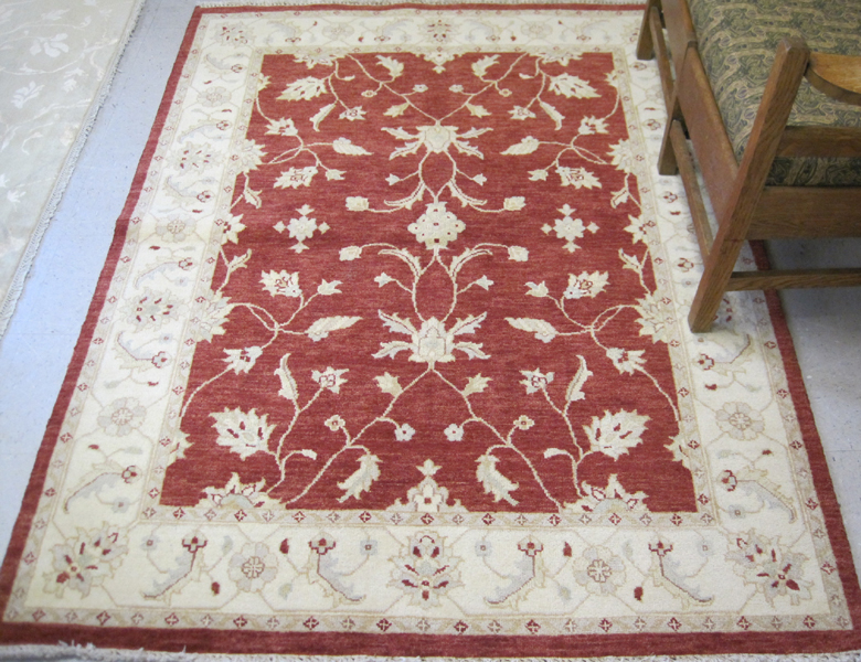 Appraisal: HAND KNOTTED ORIENTAL AREA RUG Pakistani Persian overall khaki floral