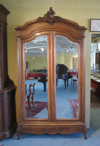 Appraisal: An E th C French Armoire of walnut and walnut