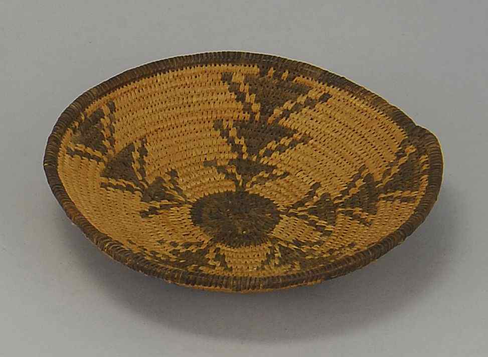 Appraisal: APACHE BASKETMid- th CenturyIn bowl form with tree-like design Diameter