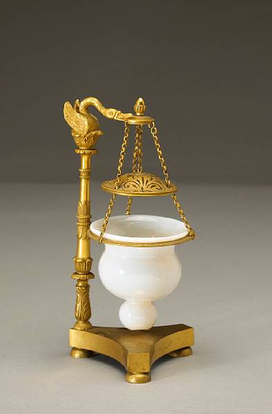 Appraisal: An Empire gilt bronze and opaline glass brule-parfume first quarter