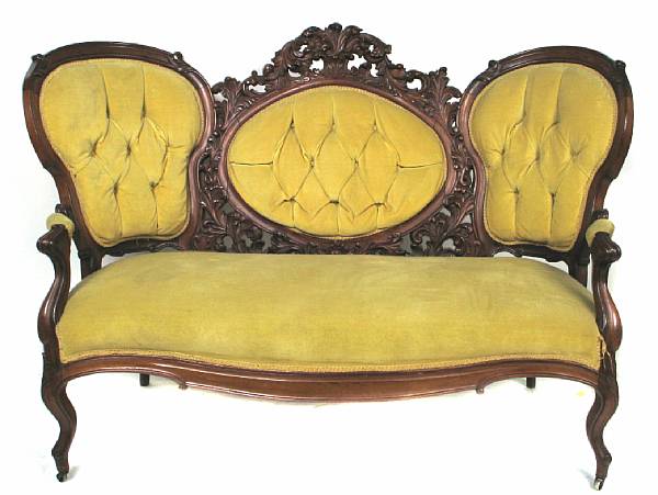 Appraisal: An American Rococo Revival carved mahogany sofa height in width