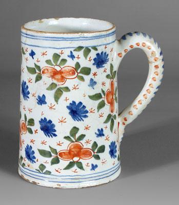 Appraisal: Delft tankard polychrome flowers and leaves handle with dot-and-dash decoration