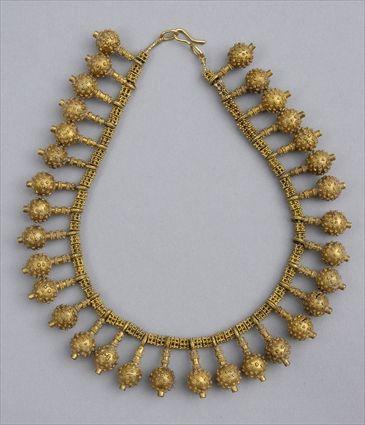 Appraisal: GOLD POMEGRANATE PENDANT NECKLACE Strand of doubled up granulated beads