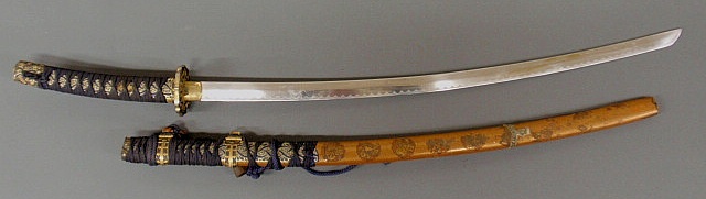 Appraisal: Japanese Samurai sword with gilt over metal decoration l