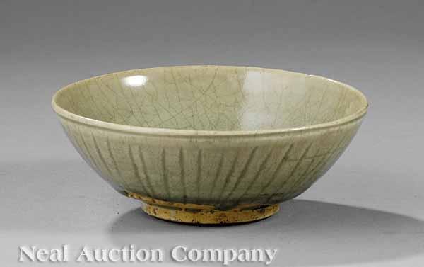 Appraisal: A Chinese Longquan-Style Crackle-Glazed Celadon Bowl probably Ming - carved